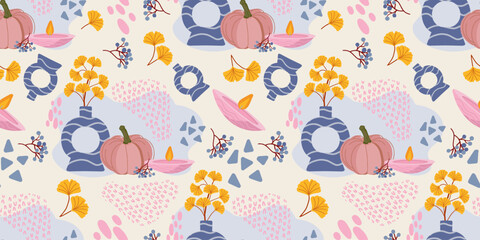 Playful seamless pattern with soft colored pumpkins, ginkgo biloba leaves, abstract vases, candles, and berries on  light background. Perfect for textile prints, wrapping paper, and decor