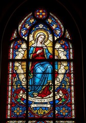 Stained Glass Depicting the Assumption of Mary in a Gothic Church Window