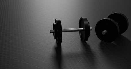 Dumbbell with a gym matt and a light source from top dark gym background