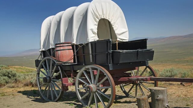 Iconic covered wagon used by emigrant pioneer settlers making their way to the west of the America in the 1800's. It was pulled by mules or horses.