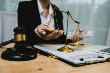 A lawyer in formal attire holds money and balances scales of justice, symbolizing legal decisions,...