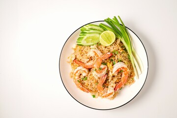 Homemade fried rice with shrimps and egg, on a white background,thai food,asian food