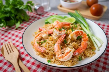 Fried rice with shrimps on a white plate