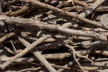 Wood stacked on a concrete floor