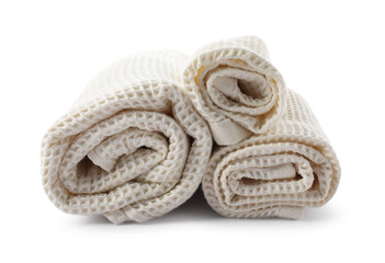 Clean rolled waffle towels isolated on white