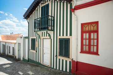 Colorful Striped Houses in Costa Nova, Aveiro, Portugal on a Sunny Day