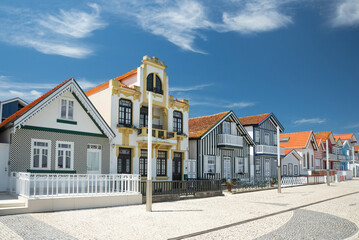 Colorful Striped Houses in Costa Nova, Aveiro, Portugal on a Sunny Day