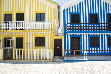 Colorful Striped Houses in Costa Nova, Aveiro, Portugal on a Sunny Day