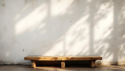 Obraz premium Rustic Wooden Bench Against White Wall with Sunlight Shadows, Minimalist Interior Design, Empty Space for Product Placement