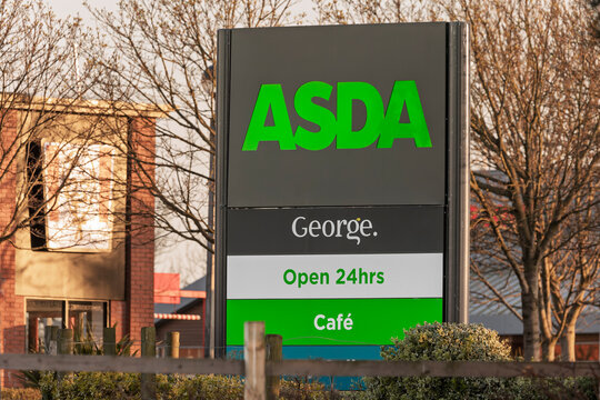 Ayr, Scotland, UK &ndash; April 7, 2025: ASDA supermarket retail signage with George clothing brand and 24-hour service information