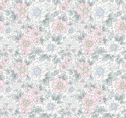 Vector seamless pattern. Liberty pattern in small flowers. Small pastel colorful flowers. White background. Ditsy floral background. Delicate vintage template for fashion prints. Stock vector pattern
