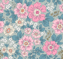 Vintage seamless floral pattern. Liberty style background of small pastel pink and cream flowers. Small flowers scattered over a green gray background. Stock vector for printing on surfaces. Floral