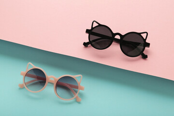 Kids sunglasses on colorful background. Sun protection
