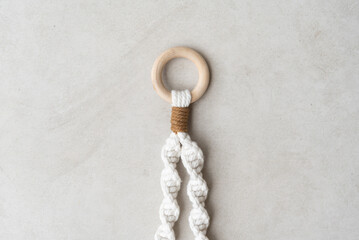 Handmade macrame on space background.