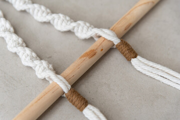 Handmade macrame on space background.