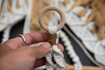 Handmade macrame on space background.