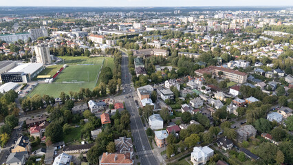 Aerial View of Suburban Neighborhood with Green Spaces