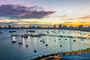 The building and skyscrapers in twilight time in Pattaya,Thailand. Pattaya city is famous about sea sport and night life entertainment.