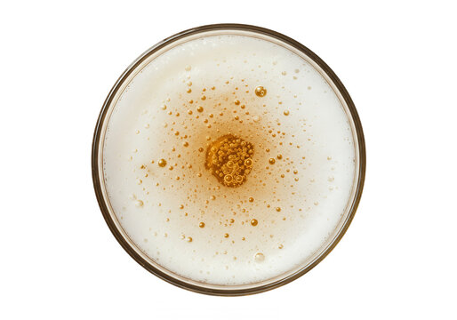 Top view of a frothy beer with foam isolated on transparent background