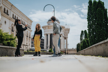 A group of young friends spending time together outside near historical buildings and greenery....