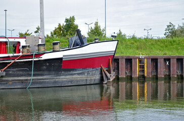 Old Cargo Ship Moored on Calm Waters of River Clyde