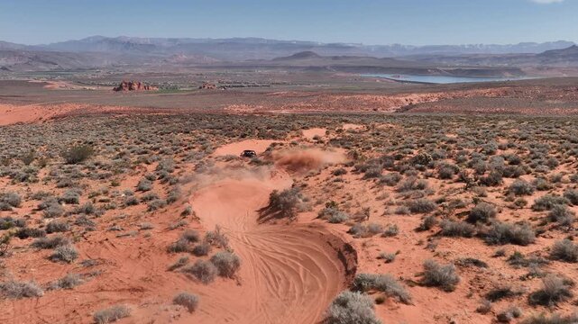 ATV Blasts Through Orange Sand Dunes Near St. George