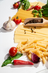 Italian Food Ingredients Pasta, Tomatoes, Basil, Garlic, and Spices