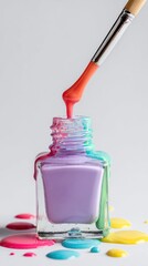 Colorful nail polish bottle dripping