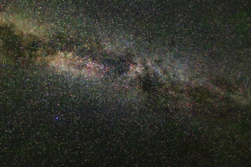 The Milky Way stretches across the night sky, dense with stars and cosmic dust. It whispers ancient stories in silence, as if the universe were humming to itself in light.