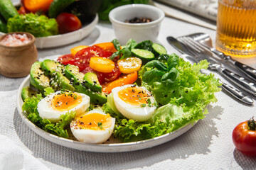Healthy Salad Bowl with Avocado, Eggs, Tomatoes and Cucumbers, 