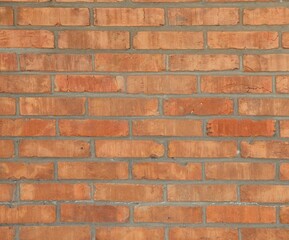 Texture of red brick wall as background, closeup