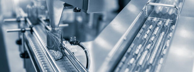 Tablet, Capsule counting machine conveyor in production line of pharmaceutical industry.