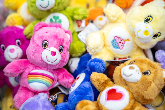 Bangkok, Thailand - 26 November 2024 : Care Bears, Colorful of teddy bear dolls in toy store, Central World. Various dolls with adorable design.