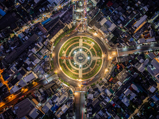 Aerial view of Wong Wian Yai, a roundabout, with cars on busy street road in Bangkok Downtown skyline, urban city Thailand. Where the statue of King Taksin is situated. Landmark architecture landscape © funfunphoto