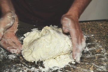 baker kneading dough