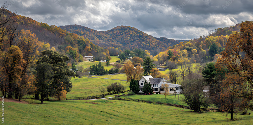 Poster panoramic view of autumn colors in an open field surrounded by rolling hills and clouds
