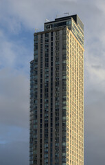 tall skyscraper residential and commercial buildings in long island city queens new york (new modern construction sky reflection clounds) minimal detail close up