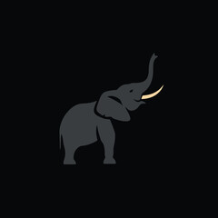 Obraz premium A stylized vector illustration of a gray elephant with tusks raised against a solid black background.