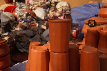Traditional clay pottery displayed at cultural fair
