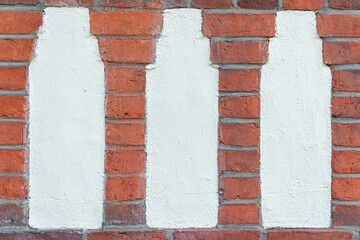 Painted Bottle Shapes on Brick Wall – Urban Pattern