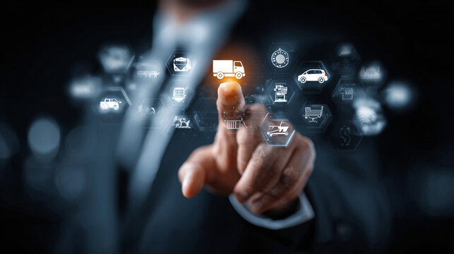 Logistics touch screen. Business man touching truck icon on digital interface with icons for transport, shipping and global delivery. Business technology concept. - Powered by Adobe
