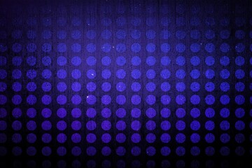 Indigo polka dots pattern on a dark background.