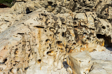 a protruding piece of stone or rock