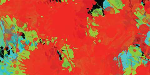 Abstract artistic composition of vibrant splattered paint with red green and blue hues against black background