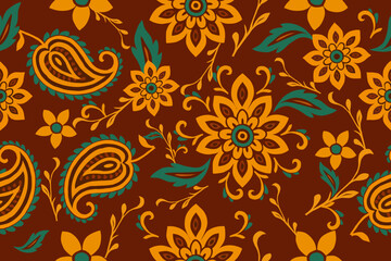 Obraz premium Seamless floral and paisley pattern with warm tones of orange, teal, and brown. Perfect for boho textiles, ethnic prints, wallpapers, and decorative designs.