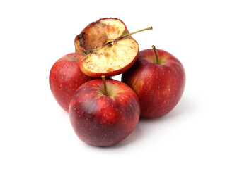 Spoiled apple and good ones isolated on white
