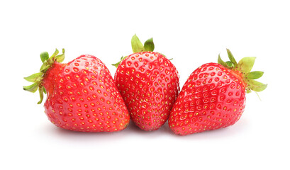 Three fresh ripe strawberries isolated on white