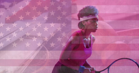 Tennis player gripping racket in tank top preparing shot on purple-lit court with USA flag overlay