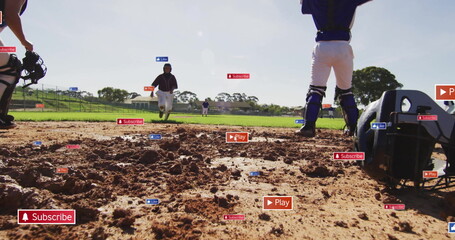 Sprinting jersey runner approaching home plate on diamond, with catcher helmet and mitt