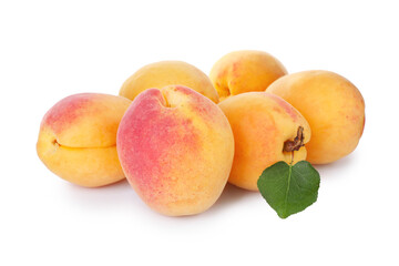 Fresh ripe apricots with green leaf isolated on white